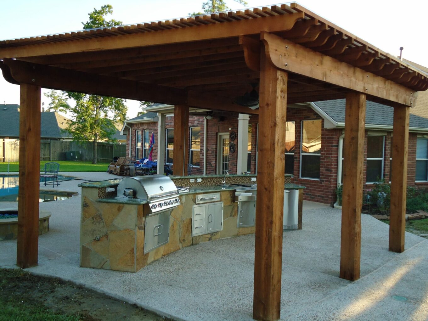 A large outdoor grill area with an open roof.