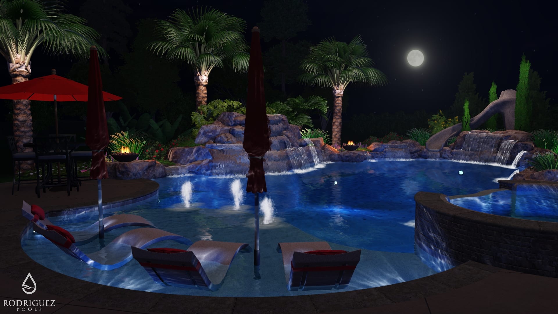 A pool with a waterfall and trees at night.